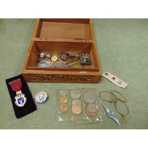 162 - Carved wooden box containing badges etc.