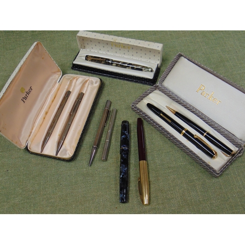 165 - Various vintage fountain pens, three silver propelling pencils etc.