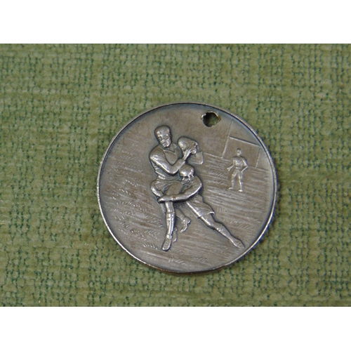 17 - Vintage white metal RAF rugby medal.