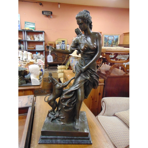 178 - Good reproduction bronze figure, Diana the Huntress, with dog at her feet. 27