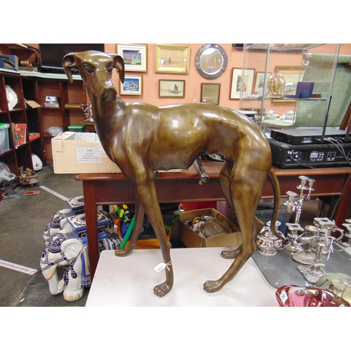 179 - Good modern large bronze figure of a female whippet. 32