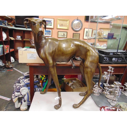 179 - Good modern large bronze figure of a female whippet. 32