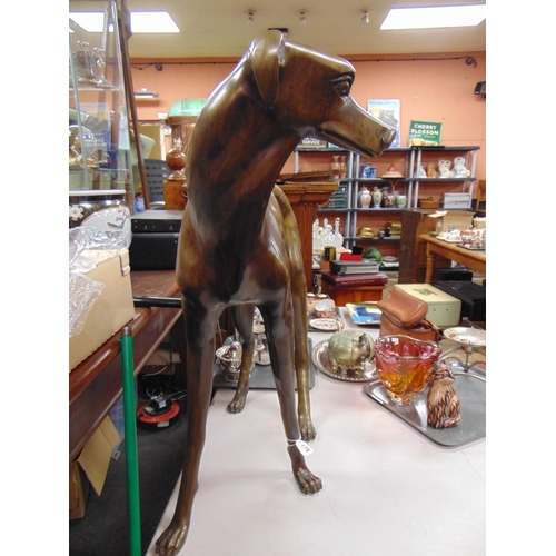 179 - Good modern large bronze figure of a female whippet. 32