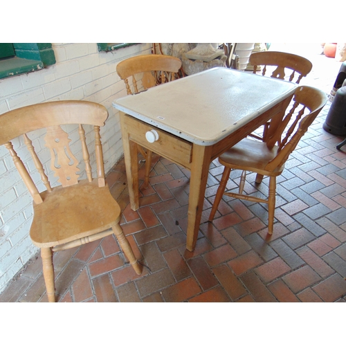 185 - Pine kitchen table, rectangular enamel top, end drawer and four splat back chairs.