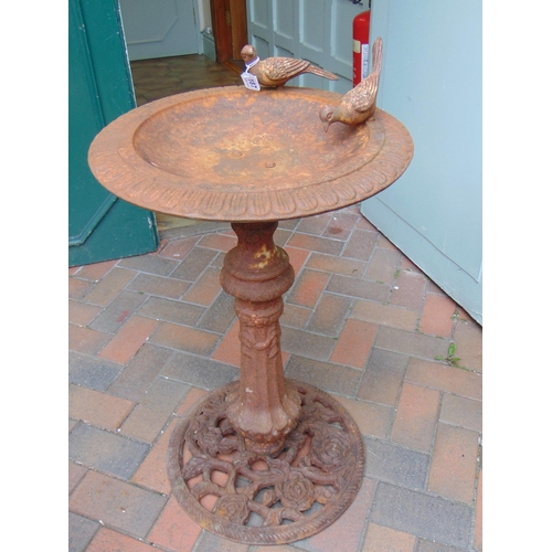 187 - Reproduction cast metal garden bird bath, having moulded figural decoration and pierced foliate base... 