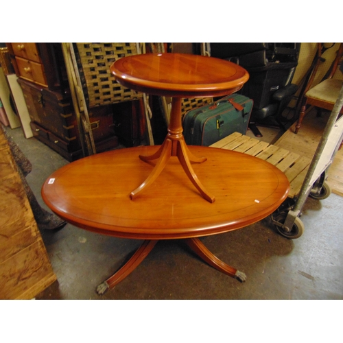 189 - Reproduction Yew wood oval form centre table, and a similar table. (2).