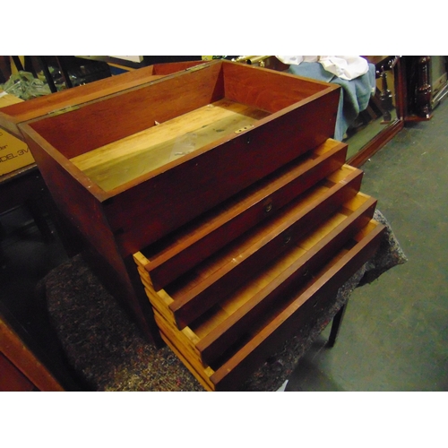 191 - Teak table top specimen chest, lift up lid, four drawers with brass handles. 17 x 22 x 15