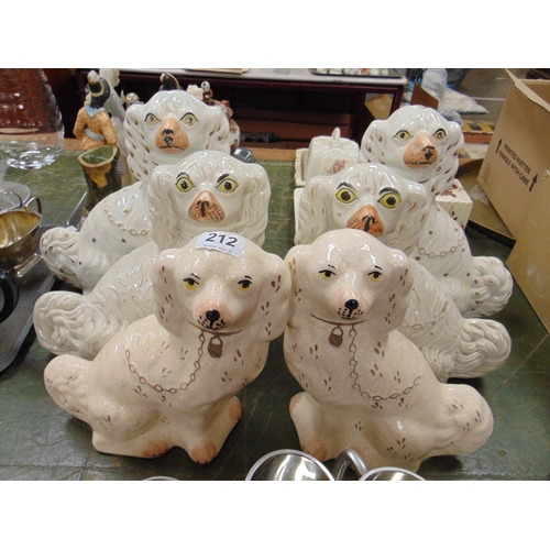 212 - Three pairs of Staffordshire spaniels.