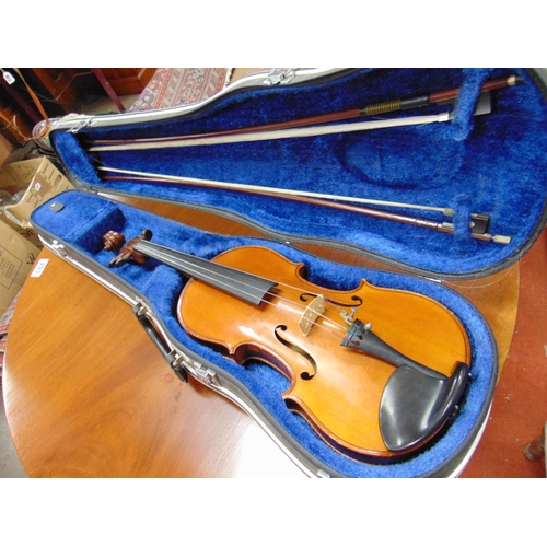 253 - Cased modern violin, having 14