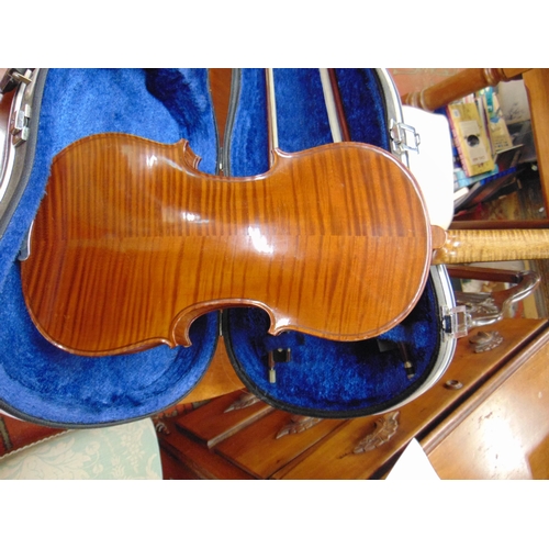 253 - Cased modern violin, having 14