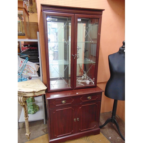 266 - Reproduction cupboard bookcase, glazed upper portion with drawers and cupboards to base. 71 x 31 x 1... 