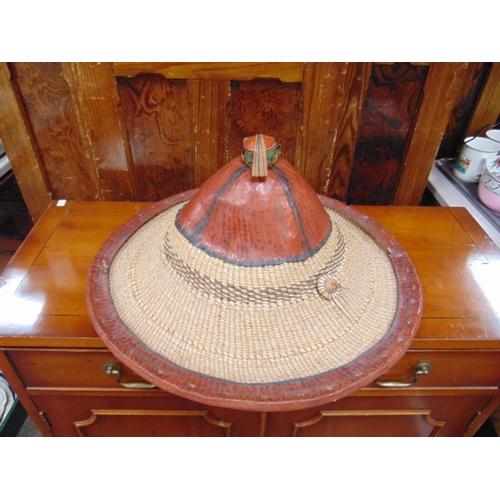 281 - Oriental conical form hat.