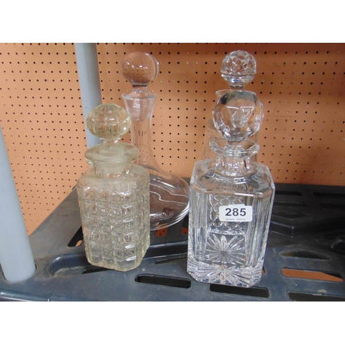 285 - Ship's decanter and three others. (4).