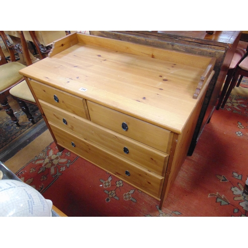 298 - Pine effect chest of two short and three long drawers with metal ring handles. 32 x 347 x 19