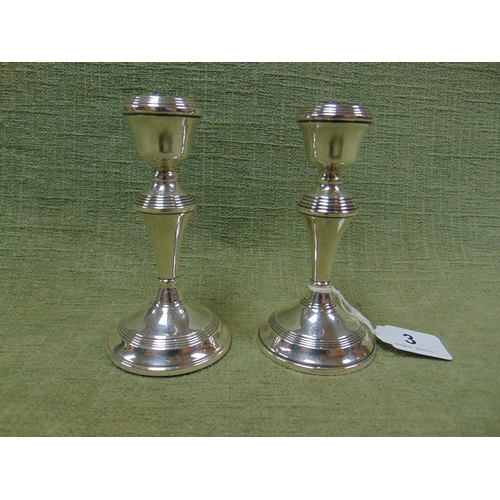 3 - Pair of modern silver squat candlesticks with filled bases, 5.5