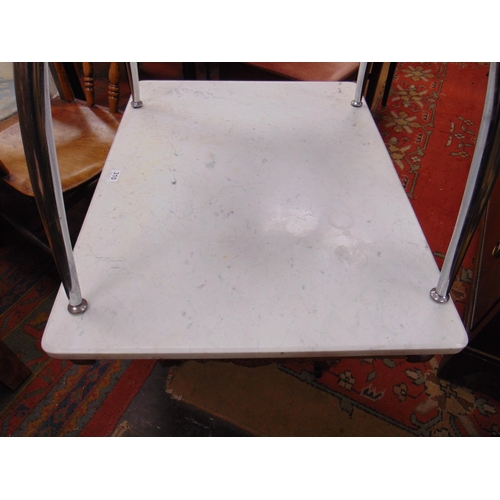 310 - Aesthetic influenced marble topped centre table, set on quatre form base. 21 x 32 x 24