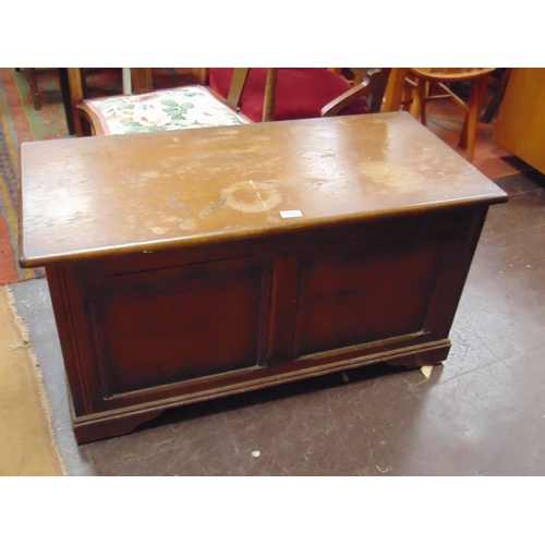 312 - Antique style blanket box, lift up lid and panel front, set on bracket feet. 20 x 37.5 x 17