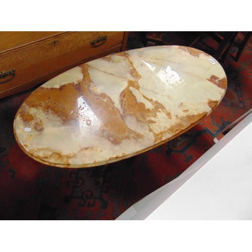 331 - An onyx effect oval form centre table, set on gilt metal base, 17 x 39 x 18