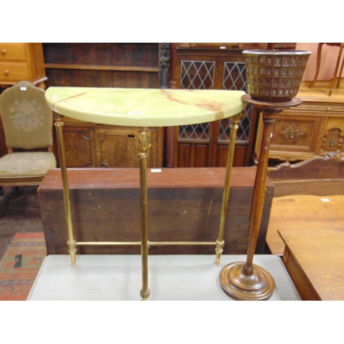 338 - An onyx effect topped demi lune hall table and a jardiniere stand (2).