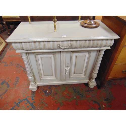 339 - Continental painted side cabinet, single long drawer, pair of cupboard doors flanked by turned colum... 