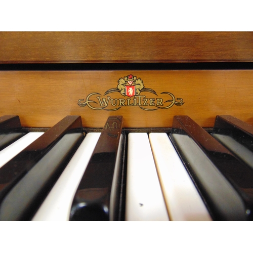 346 - Wurlitzer cherry walnut cased spinet piano, with stool.