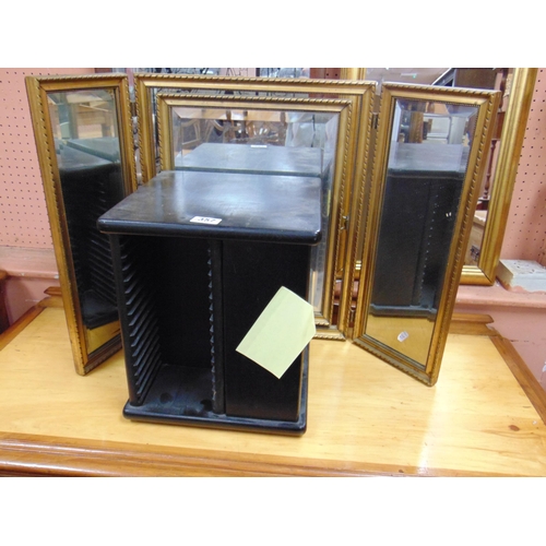 357 - Three plate folding dressing table mirror, and a cd holder. (2).