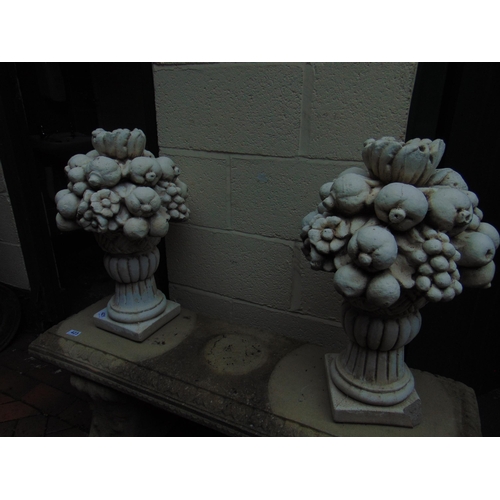 421 - Pair of ornamental garden sculptures, studies of fruit, each 23