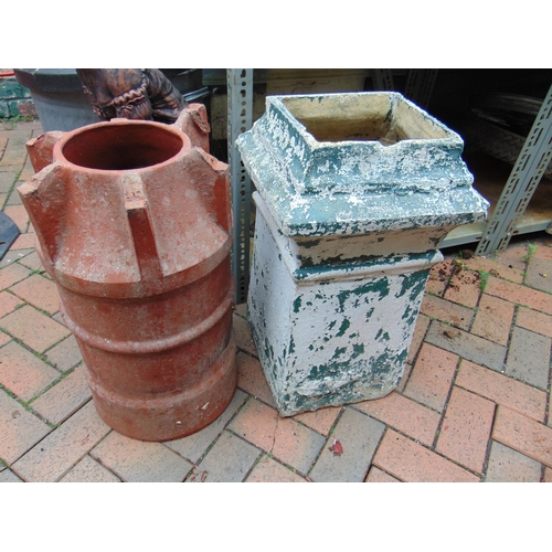 428 - Two terracotta chimney pots.