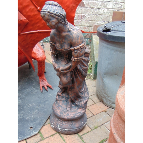 429 - Reproduction garden statue, modelled as a woman holding  a bird. 31