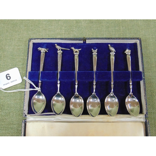 6 - Cased set of six Edwardian silver teaspoons, the handles cast with hunting animals, Birmingham 1906,... 