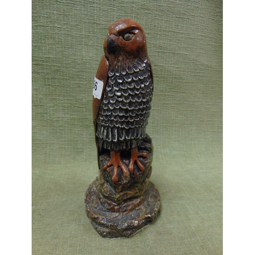 66 - Studio pottery figure of a perched eagle, 10.75