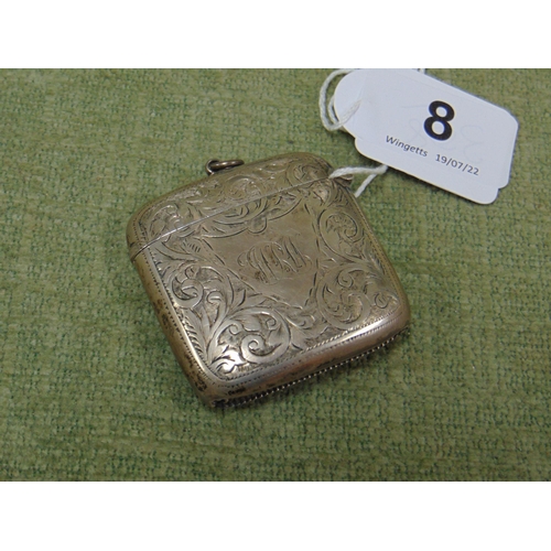 8 - George V silver vesta case with scroll engraved decoration, Birmingham 1911.