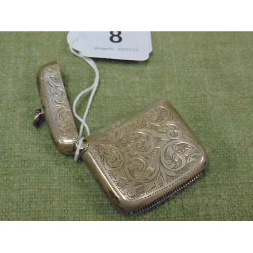 8 - George V silver vesta case with scroll engraved decoration, Birmingham 1911.