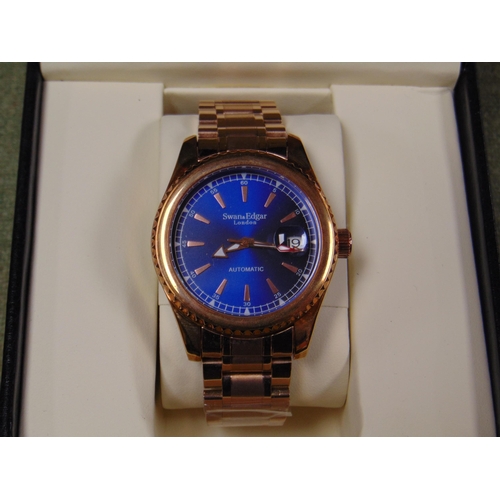 86 - Swan & Edgar Automatic gents wristwatch with rose gold colour case and bracelet, blue dial.