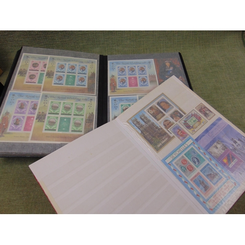 88 - Two albums containing a collection of commemorative stamps.