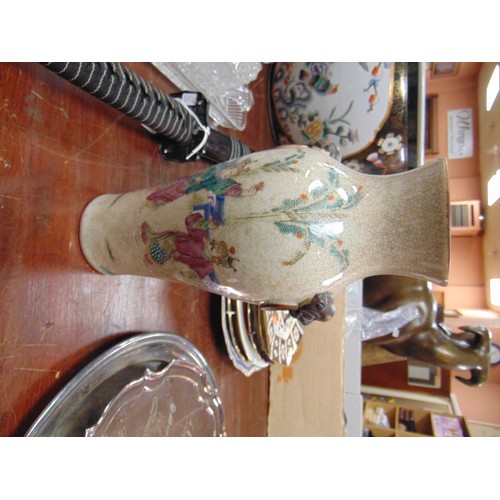 62 - Three various Oriental vases and an Oriental ceramic Lion Dog.