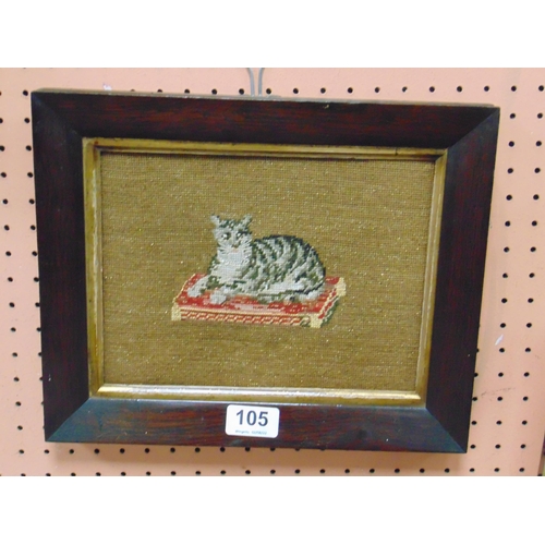 105 - Victorian rosewood framed woolwork picture of a cat on cushion.