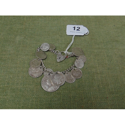 12 - Silver bracelet set with 12 Victorian and 1 George III silver coins, 57g.