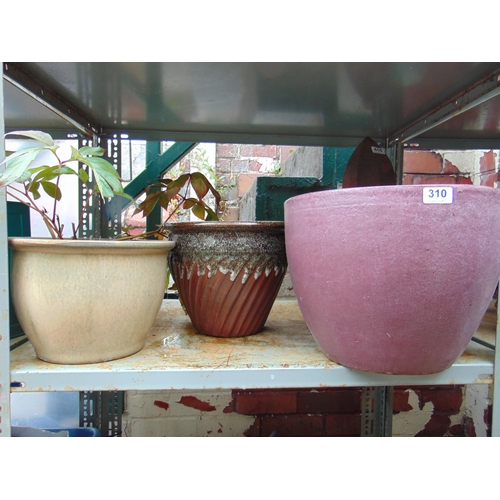 310 - Three modern garden planters.