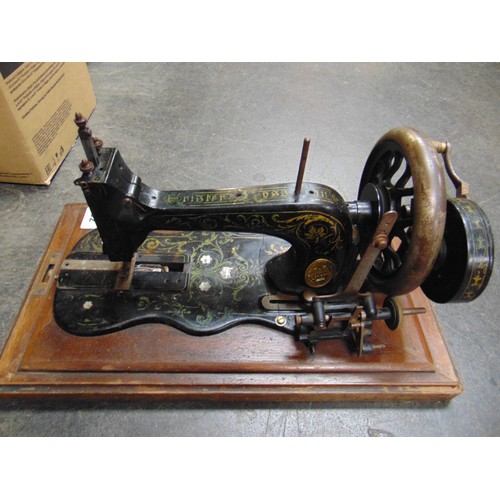 62 - Fisher Rossman manual sewing machine in case.