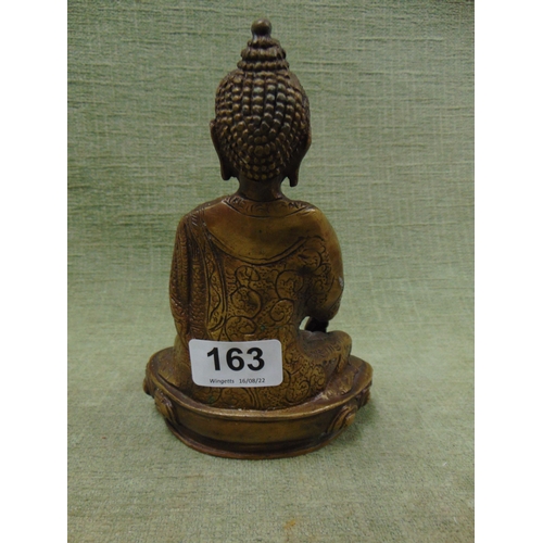 163 - Cast metal figure of a Deity, 7