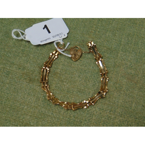 1 - 9ct yellow gold gate bracelet with heart shaped padlock and safety chain, 5.5g.