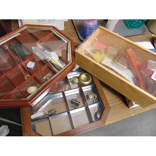 125 - Two table top display cabinet and a box containing collectables.