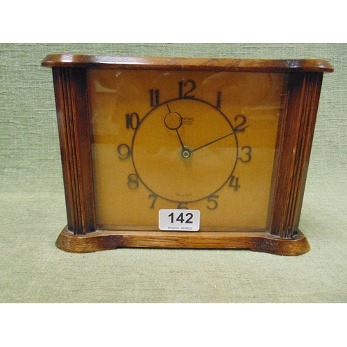 142 - Smiths oak cased mantle clock.