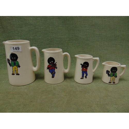 149 - Set of four graduated Staffordshire jugs decorated with Golliwogs.