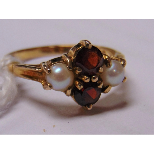 15 - 9ct yellow gold ring set with garnets and seed pearls, size N, 2.8g.