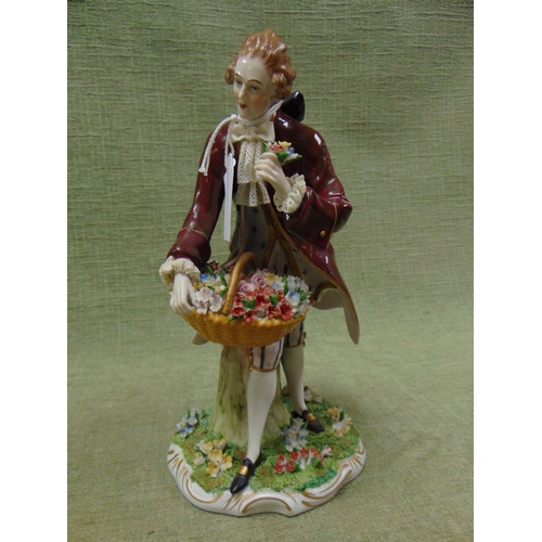 181 - Sitzendorf porcelain figure of a man with basket of flowers, 10