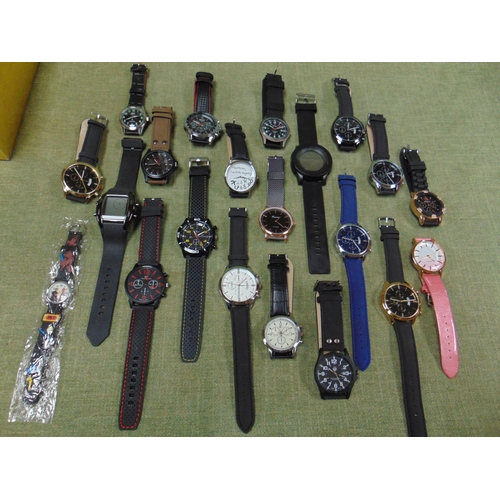 24 - Collection of ex display wristwatches.