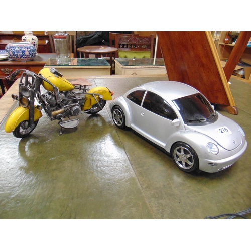 276 - Battery operated model car, and a model motorcycle. (2).