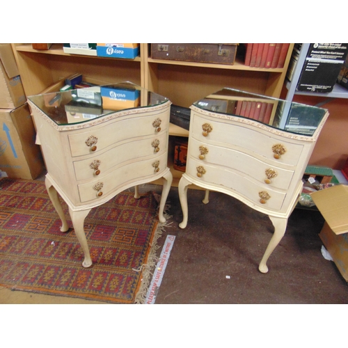 284 - Pair of mirrored topped three drawer bedside chests, on cabriole supports.